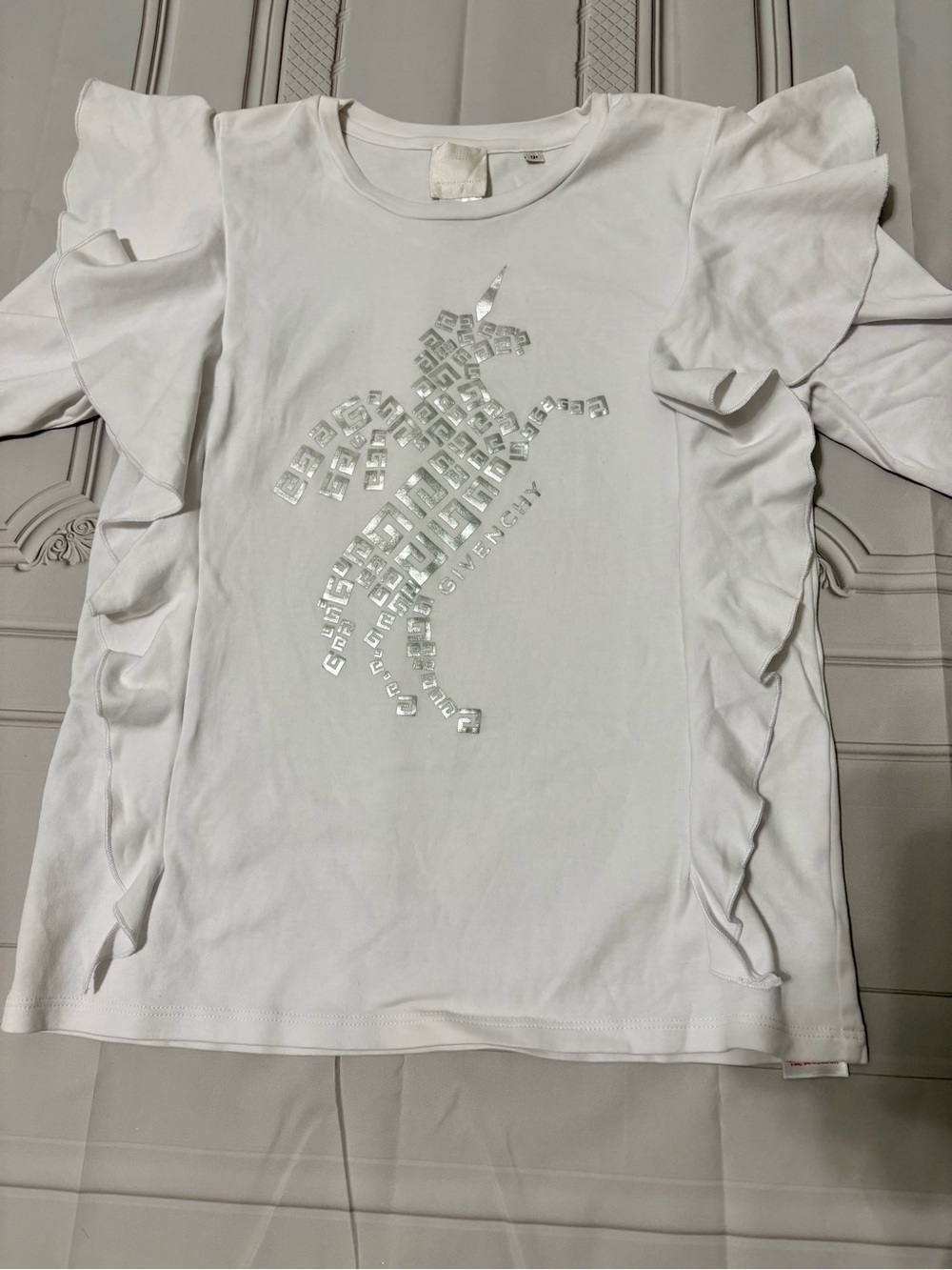 Givenchy White Long-Sleeve Ruffle Tee with Silver Unicorn Motif